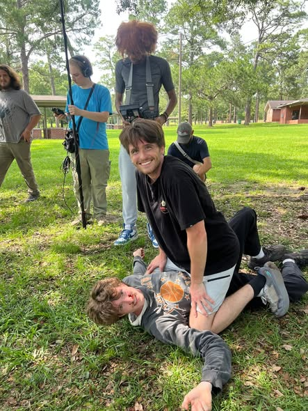 Jesse and cast members during an outdoor film shoot